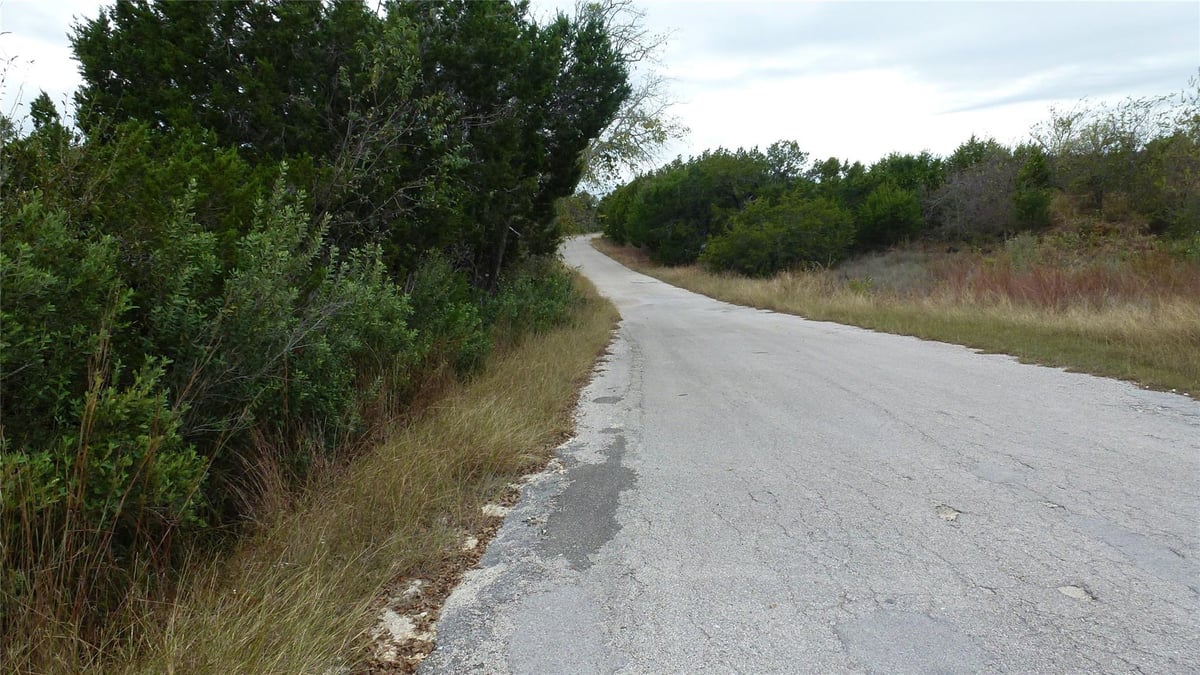 View 20815 Rawhide Trl in BAR-K RANCHES 20815 Rawhide Trl - front exterior - Luxury lot in BAR-K RANCHES, Lago Vista, TX