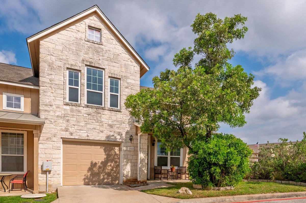 View 20900 Waterside Dr Unit #1 in Waterside Oaks Condo Amd 20900 Waterside Dr Unit #1 - front exterior - Luxury home in Waterside Oaks Condo Amd, Lago Vista, TX