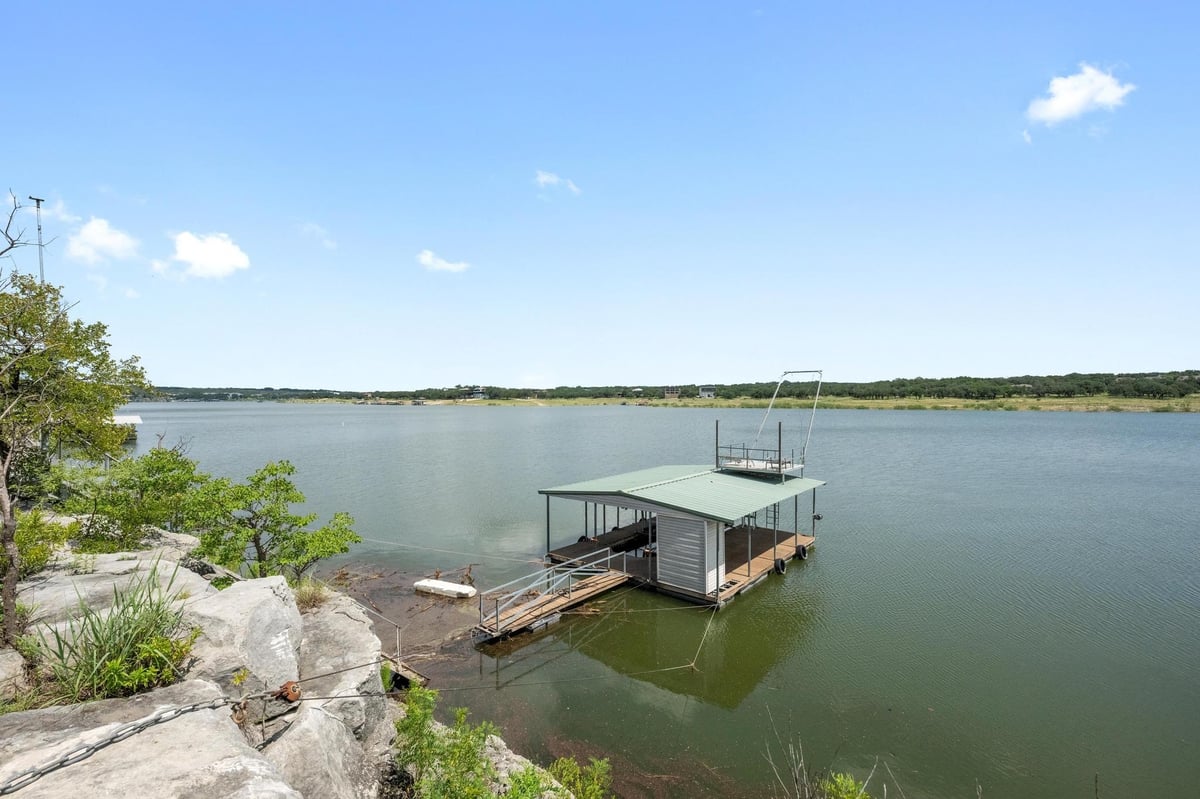 View 20926 W Lakeshore Dr in Lakewood Estates 20926 W Lakeshore Dr - front exterior - Luxury home in Lakewood Estates, Spicewood, TX