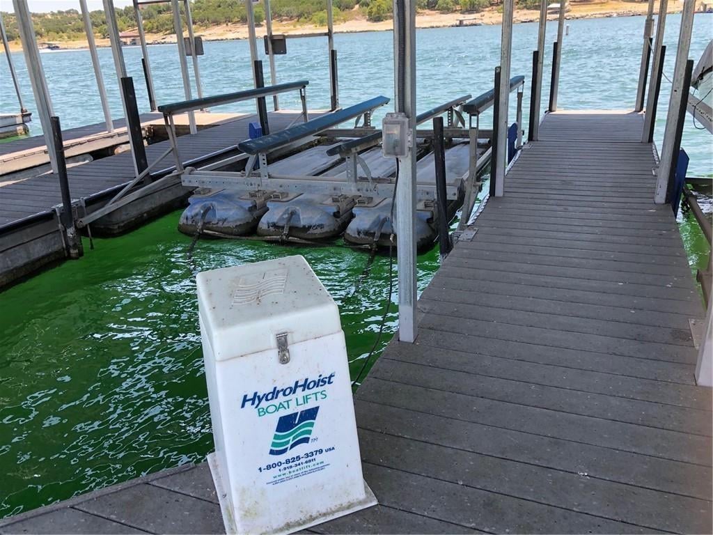 View 20990 Waterside Dr Unit #J3 in Boathouse Dockominiums 20990 Waterside Dr Unit #J3 - front exterior - Luxury lot in Boathouse Dockominiums, Lago Vista, TX