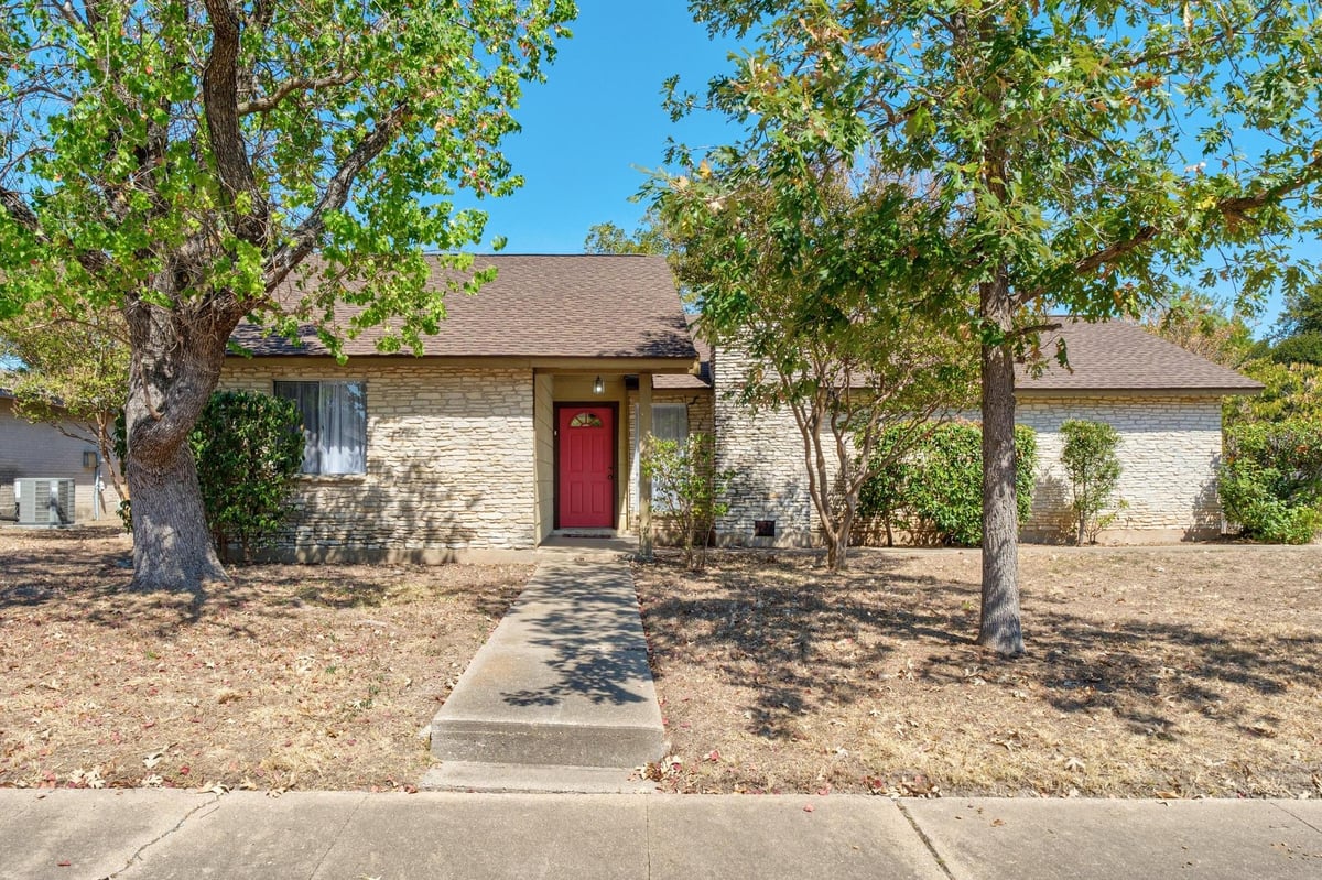 View 2100 Cindy Ln in Lamplight Village Sec 01 2100 Cindy Ln - front exterior - Luxury home in Lamplight Village Sec 01, Austin, TX