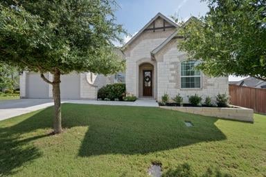 View 2100 Highland Ridge RD in Oaks at San Gabriel 2100 Highland Ridge RD - front exterior - Luxury home in Oaks at San Gabriel, Georgetown, TX