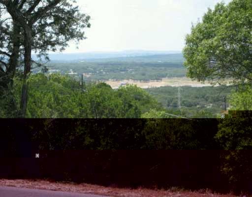 View 21102 Ridgeview RD 21102 Ridgeview RD - front exterior - Luxury lot in Lago Vista, TX