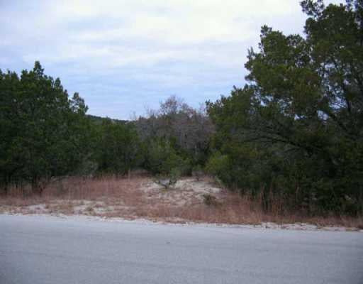 View 21106 Packsaddle TRL 21106 Packsaddle TRL - front exterior - Luxury lot in Lago Vista, TX