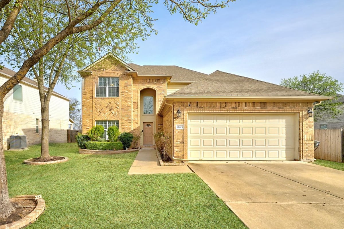 View 21205 Penny Royal Dr in Estates Rowe Lane Sec 02 21205 Penny Royal Dr - front exterior - Luxury home in Estates Rowe Lane Sec 02, Pflugerville, TX