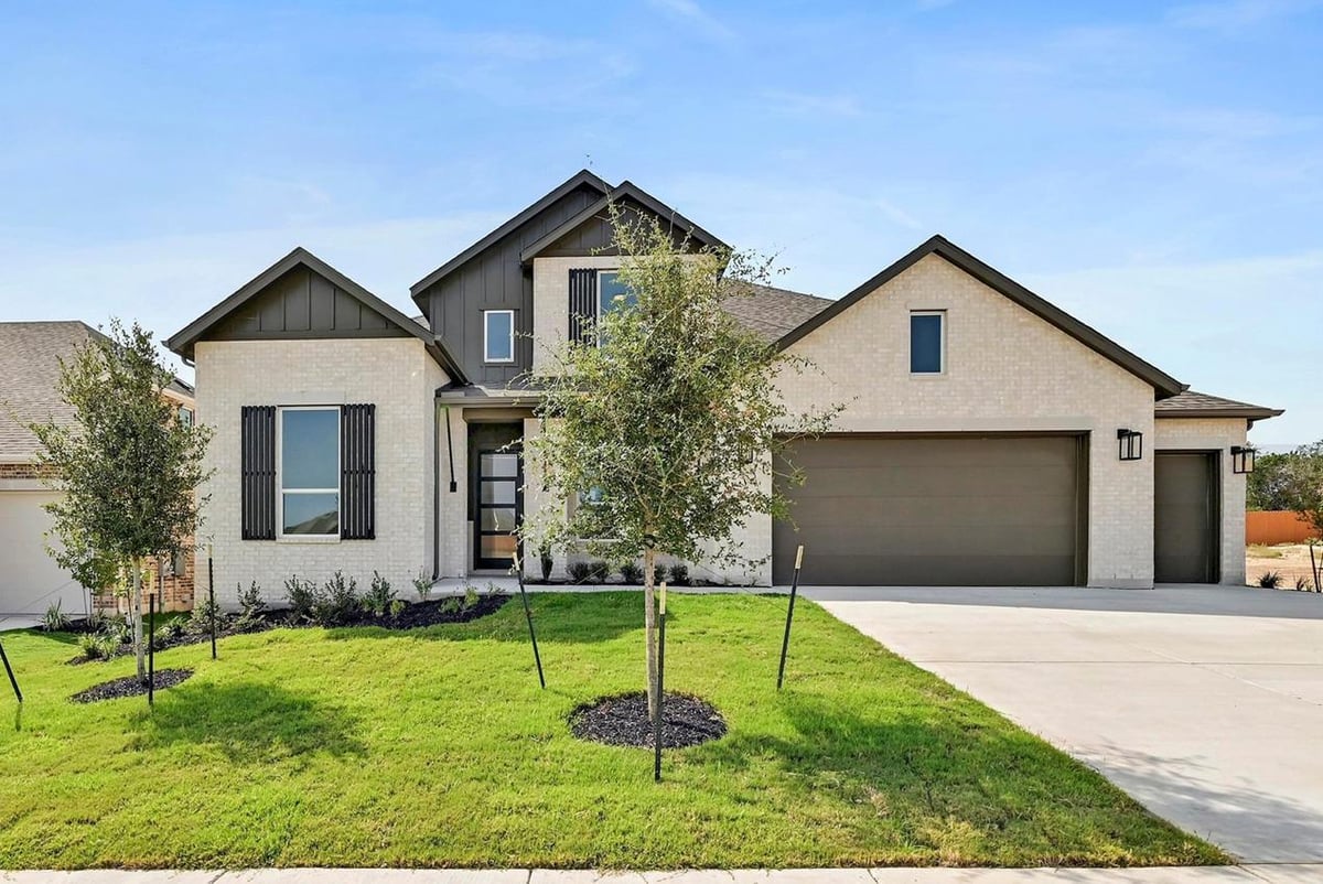 View 213 Luttrell Ln in Lariat 70s 213 Luttrell Ln - front exterior - Luxury home in Lariat 70s, Liberty Hill, TX