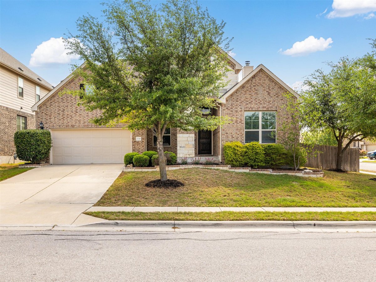 View 21301 Merveil DR in Commons At Rowe Lane Ph Iv A 21301 Merveil DR - front exterior - Luxury home in Commons At Rowe Lane Ph Iv A, Pflugerville, TX