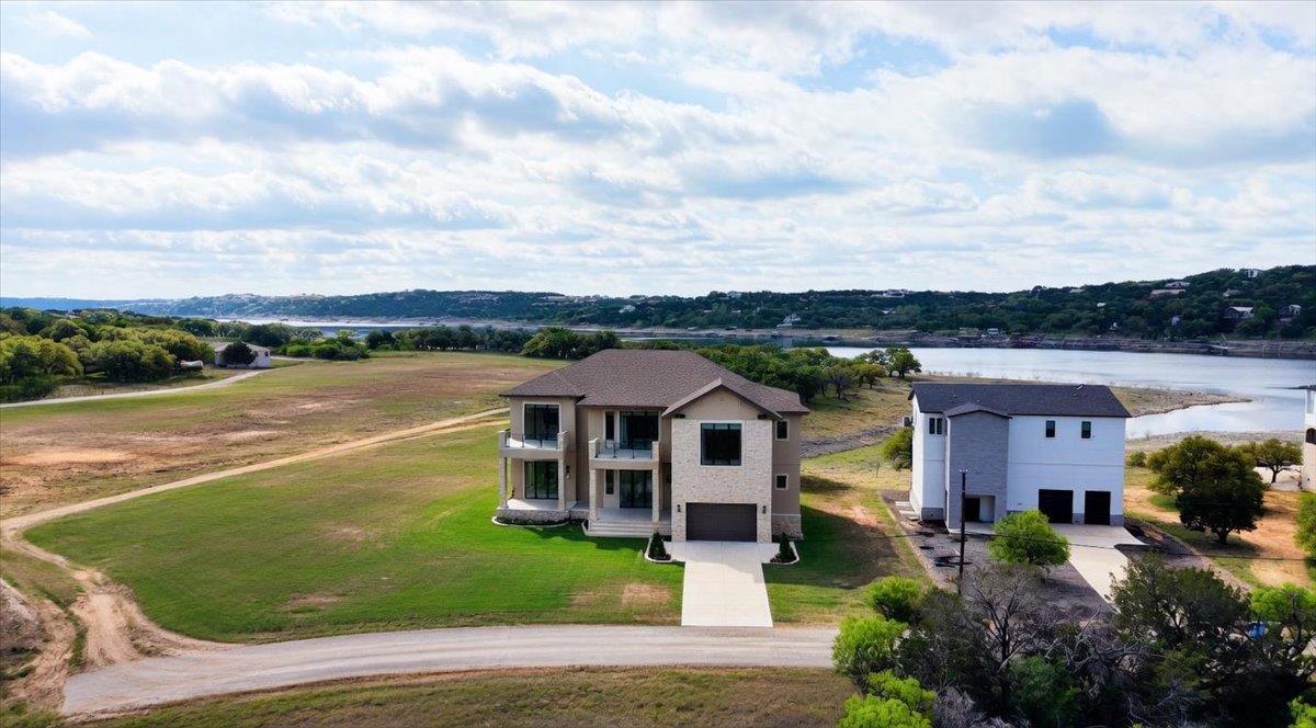 View 21307 Cardinal Ave in Emerald Bend Sec 01 21307 Cardinal Ave - front exterior - Luxury lot in Emerald Bend Sec 01, Lago Vista, TX