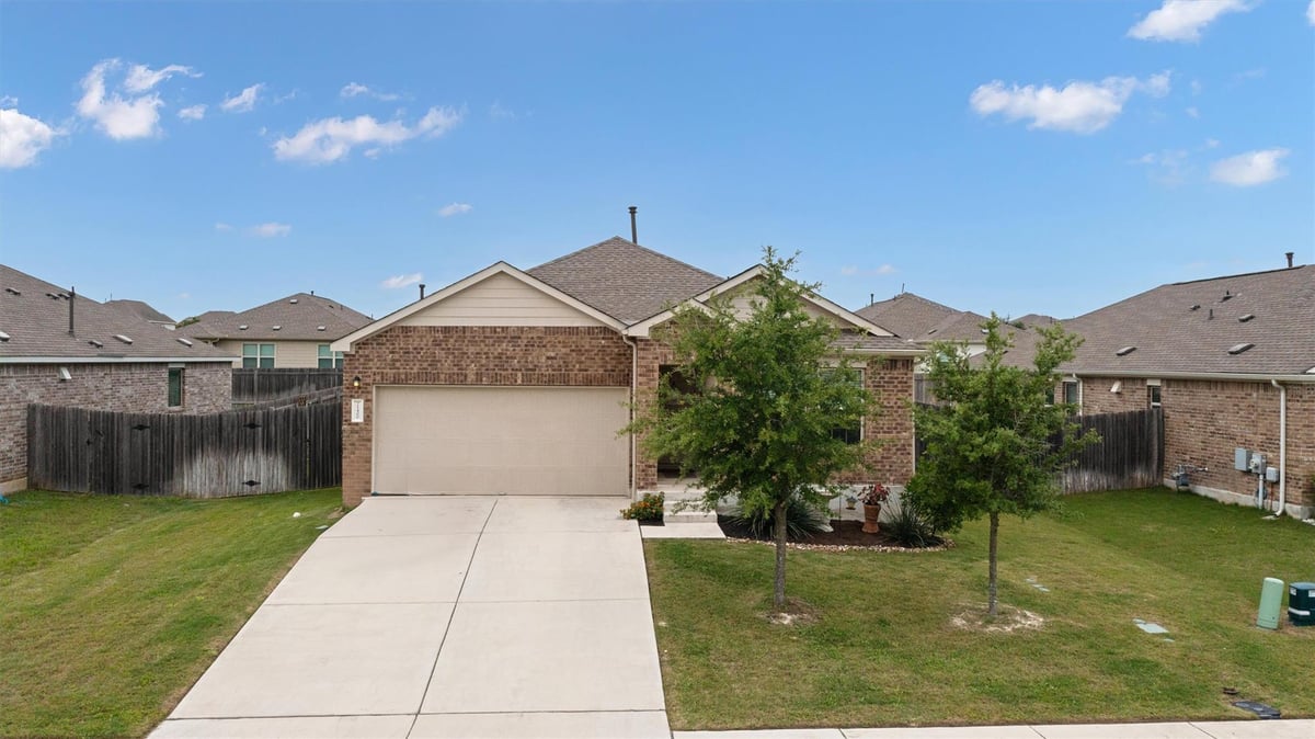 View 21400 Bird Wing Dr in Commons At Rowe 21400 Bird Wing Dr - front exterior - Luxury home in Commons At Rowe, Pflugerville, TX