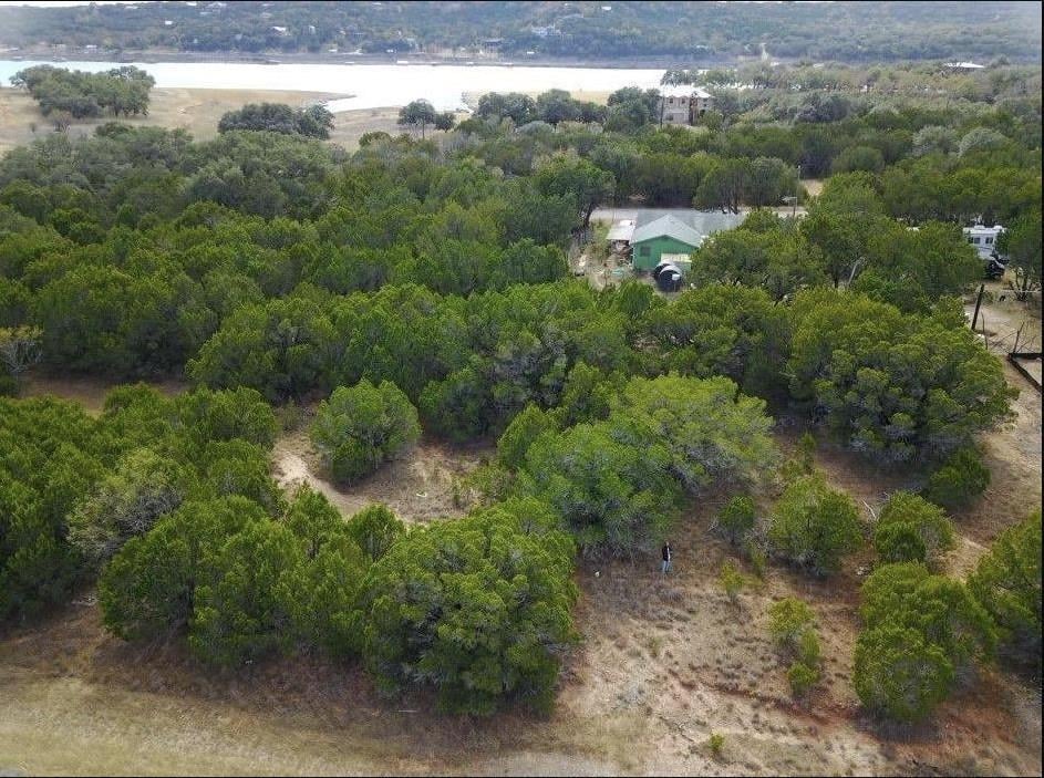 View 21407 Highland Lake Dr in Highland Lake Estates Sec 26 A 21407 Highland Lake Dr - front exterior - Luxury lot in Highland Lake Estates Sec 26 A, Lago Vista, TX