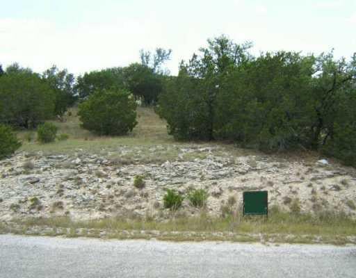 View 21507 Paine Ave 21507 Paine Ave - front exterior - Luxury lot in Lago Vista, TX