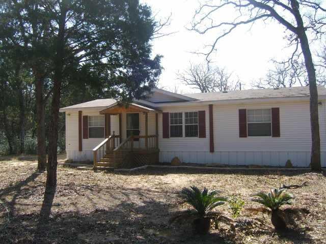View 216 Crepe Myrtle RD 216 Crepe Myrtle RD - front exterior - Luxury home in Bastrop, TX