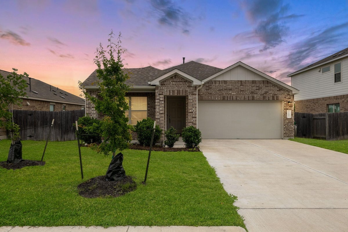 View 21601 Quick Fox Dr in Commons at Rowe Lane 21601 Quick Fox Dr - front exterior - Luxury home in Commons at Rowe Lane, Pflugerville, TX