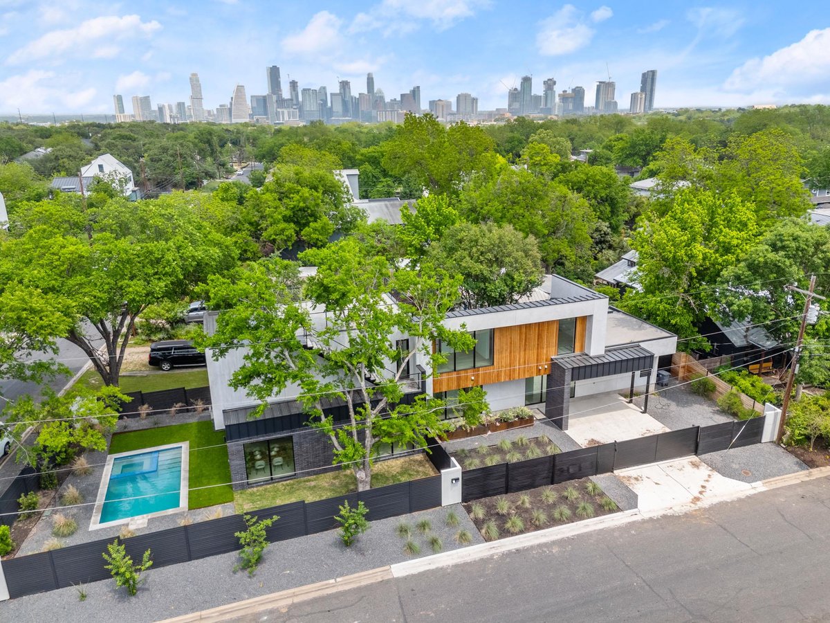 View 2215 S 3rd ST in Bouldin Creek 2215 S 3rd ST - aerial view with downtown Austin skyline view - Luxury home in Bouldin Creek, Austin, TX