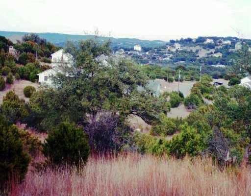 View 22302 Moulin Dr 22302 Moulin Dr - front exterior - Luxury lot in Spicewood, TX