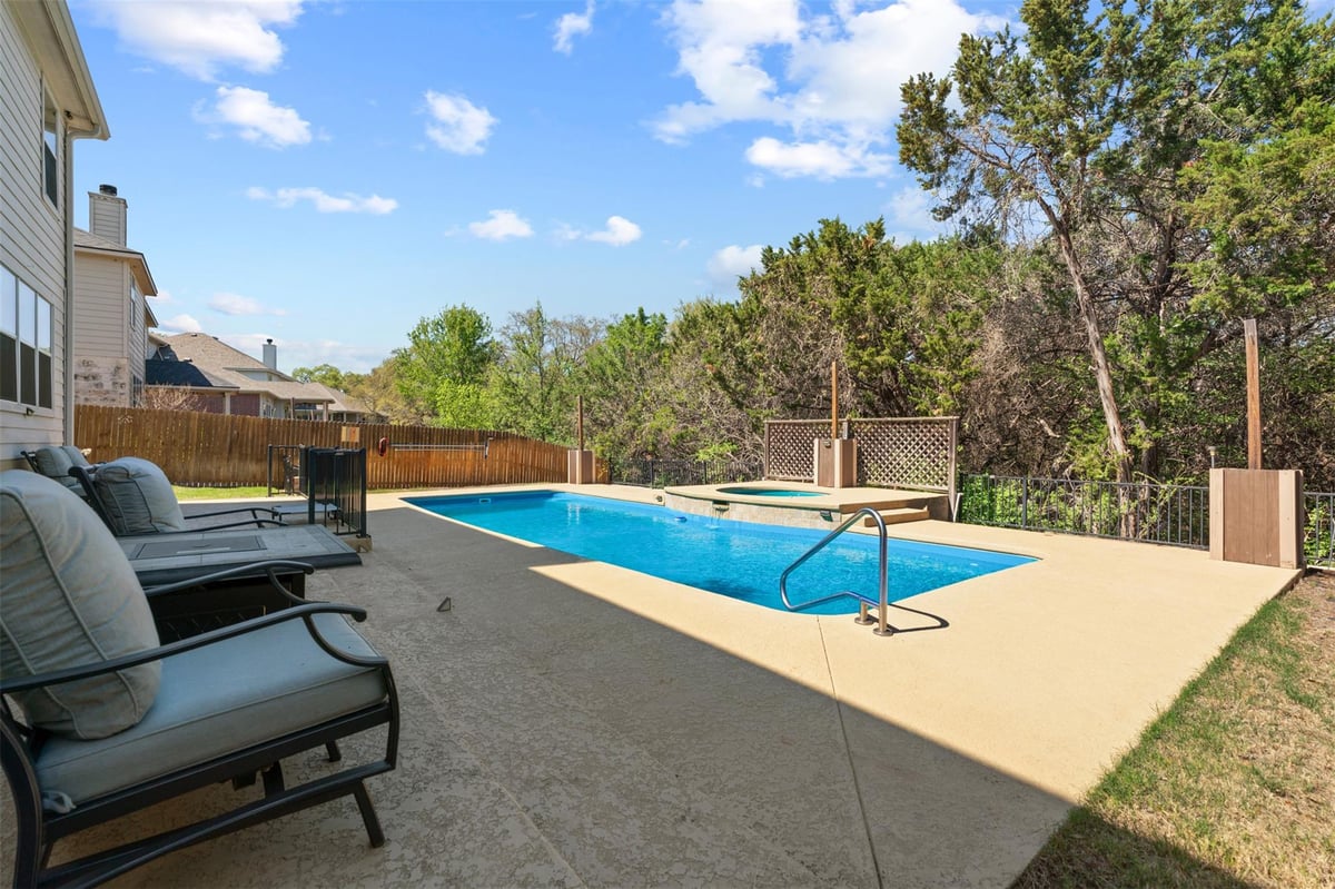 View 228 Hoot Owl Ln N in Summerlyn Ph P-2 228 Hoot Owl Ln N - front exterior - Luxury home in Summerlyn Ph P-2, Leander, TX