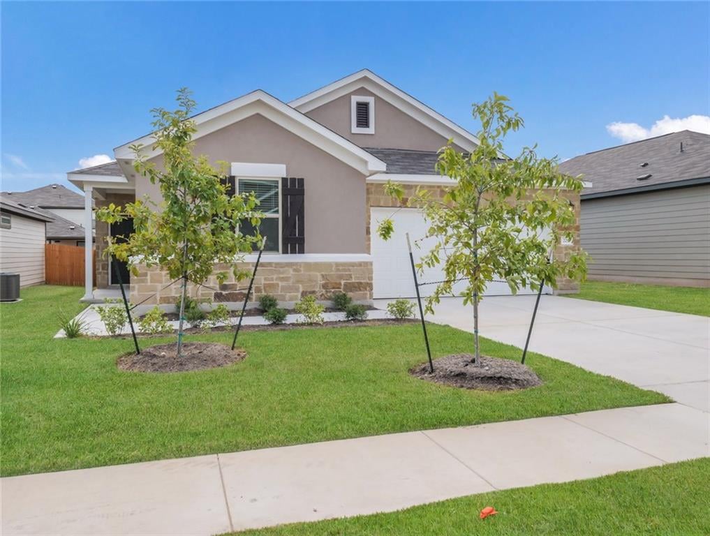 View 229 Magna Ln 229 Magna Ln - front exterior - Luxury home in Liberty Hill, TX