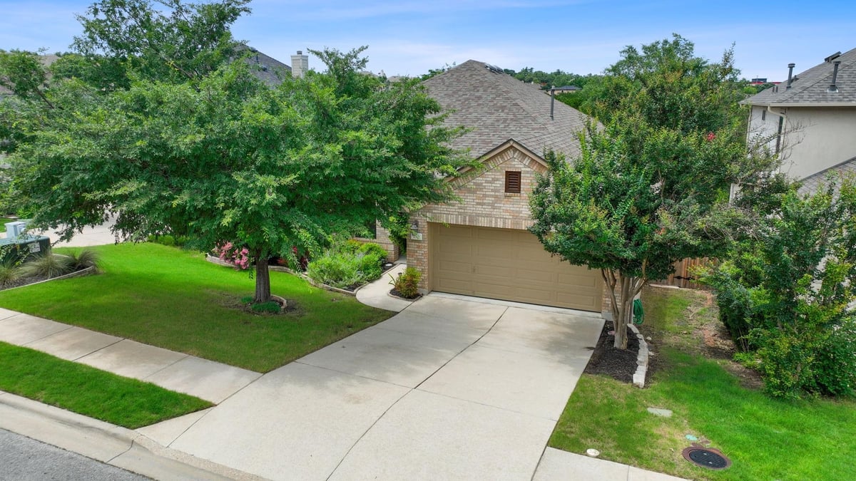 View 230 Canterbury Dr in Belterra Ph II Sec 2 230 Canterbury Dr - front exterior - Luxury home in Belterra Ph II Sec 2, Austin, TX