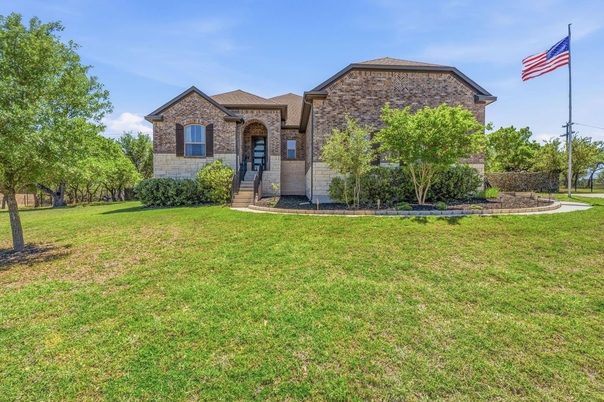 View 238 Jenn CV in Counts Estates Ph Two Aka Butler Ranch Estates 238 Jenn CV - front exterior - Luxury home in Counts Estates Ph Two Aka Butler Ranch Estates, Dripping Springs, TX