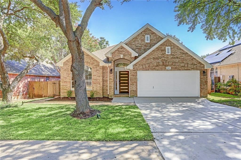 View 2405 Equestrian Trl in Scofield Farms Ph 08 Sec 01 2405 Equestrian Trl - front exterior - Luxury home in Scofield Farms Ph 08 Sec 01, Austin, TX