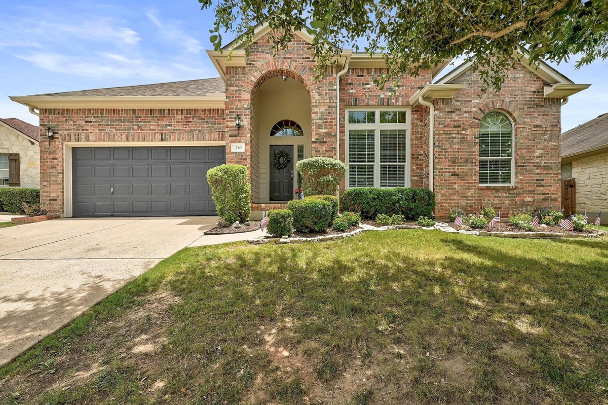 View 250 Lexington Dr in Belterra Ph II Sec 3B 250 Lexington Dr - front exterior - Luxury home in Belterra Ph II Sec 3B, Austin, TX