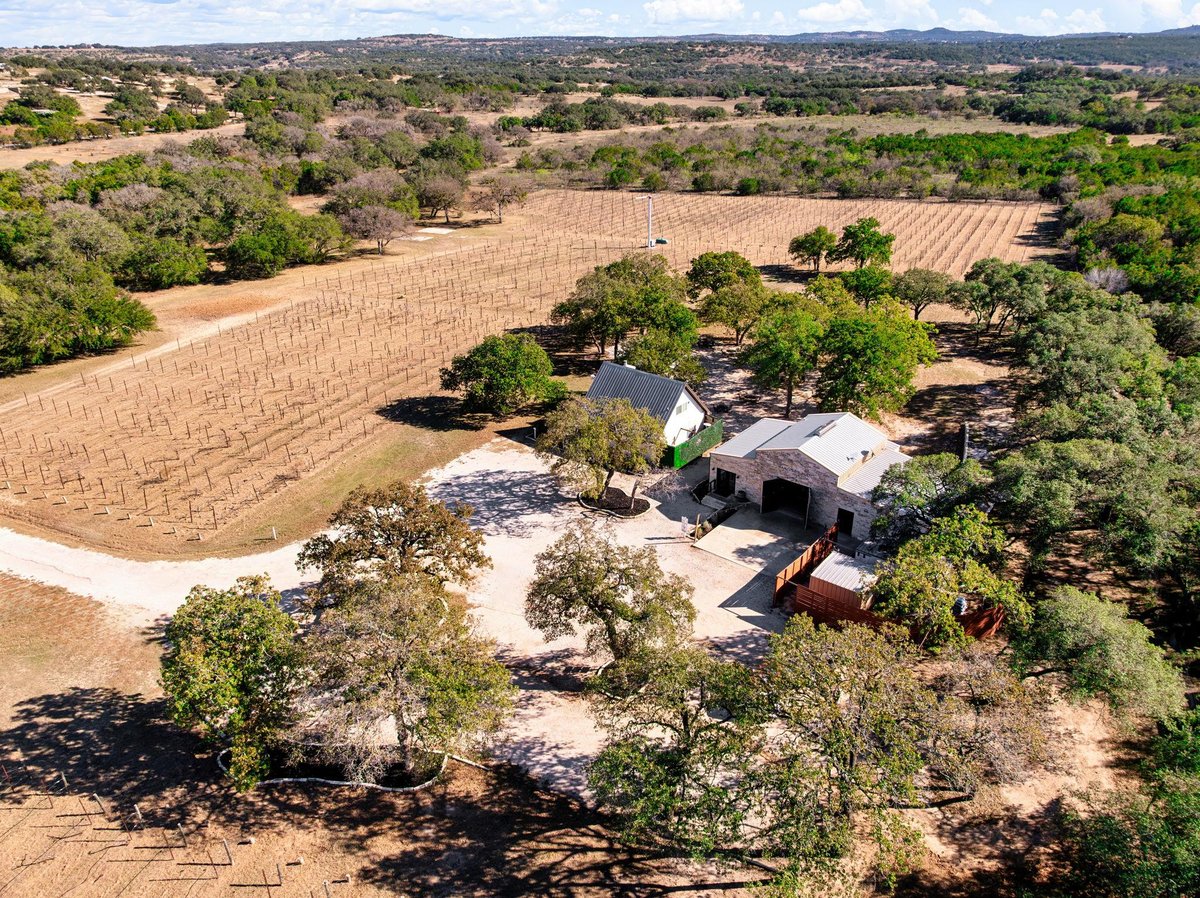 View 25711 Hamilton Pool Rd in None 25711 Hamilton Pool Rd - aerial view with 25711 Hamilton Pool Rd in Round Mountain - Luxury home in None, Round Mountain, TX