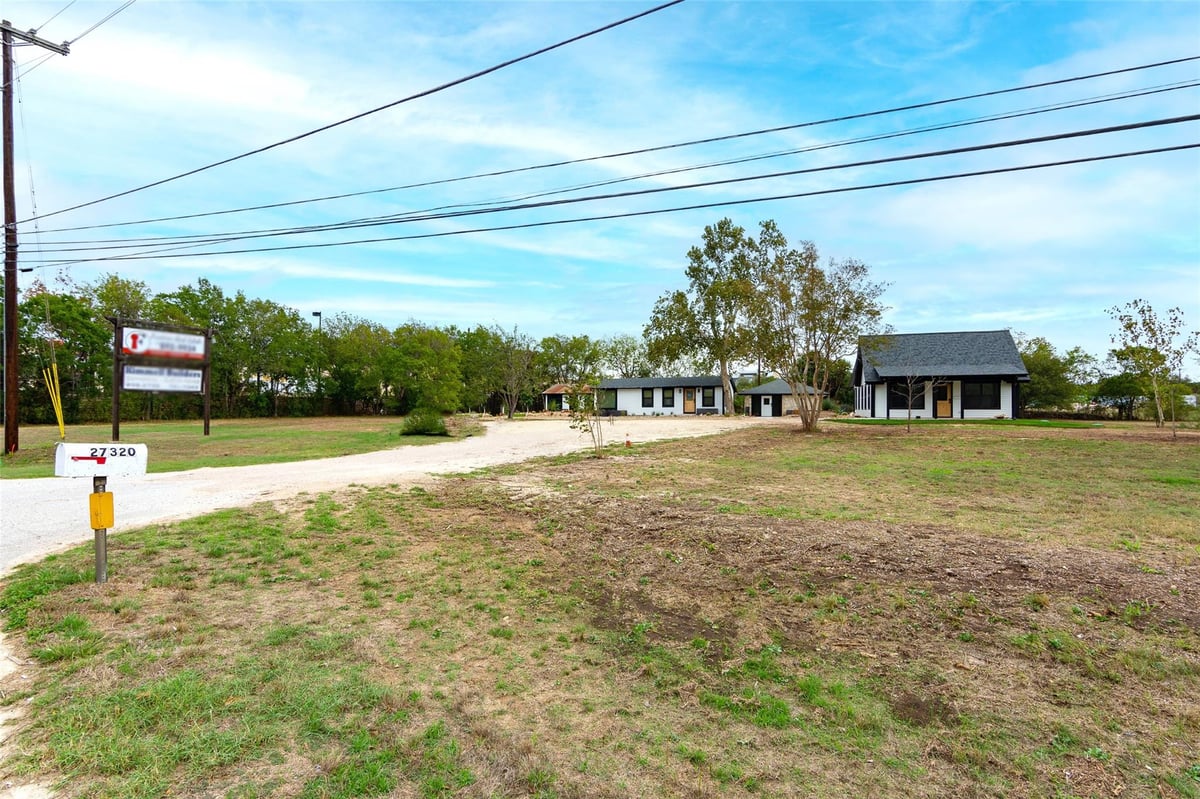 View 27320 Ranch Road 12 in P A Smith Surv Abs #415 27320 Ranch Road 12 - front exterior - Luxury home in P A Smith Surv Abs #415, Dripping Springs, TX