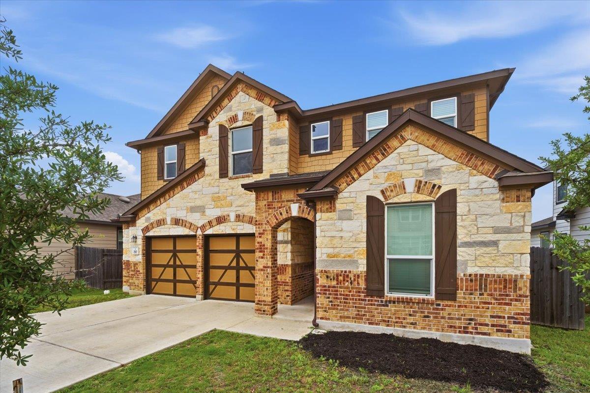 View 282 Crimson Ln in Sunset Hills Ph Two 282 Crimson Ln - front exterior - Luxury home in Sunset Hills Ph Two, Kyle, TX