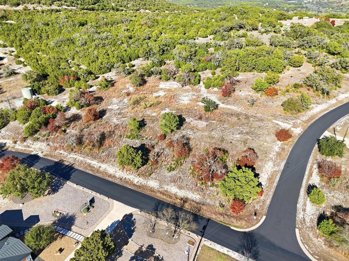 View 29910 Montana Ridge Pass in Montana Ridge 29910 Montana Ridge Pass - front exterior - Luxury lot in Montana Ridge, Marble Falls, TX