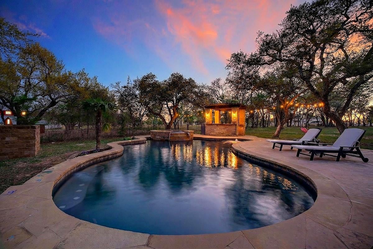 View 301 Medlin Creek Loop in Medlin Creek Ph I 301 Medlin Creek Loop - front exterior - Luxury home in Medlin Creek Ph I, Dripping Springs, TX