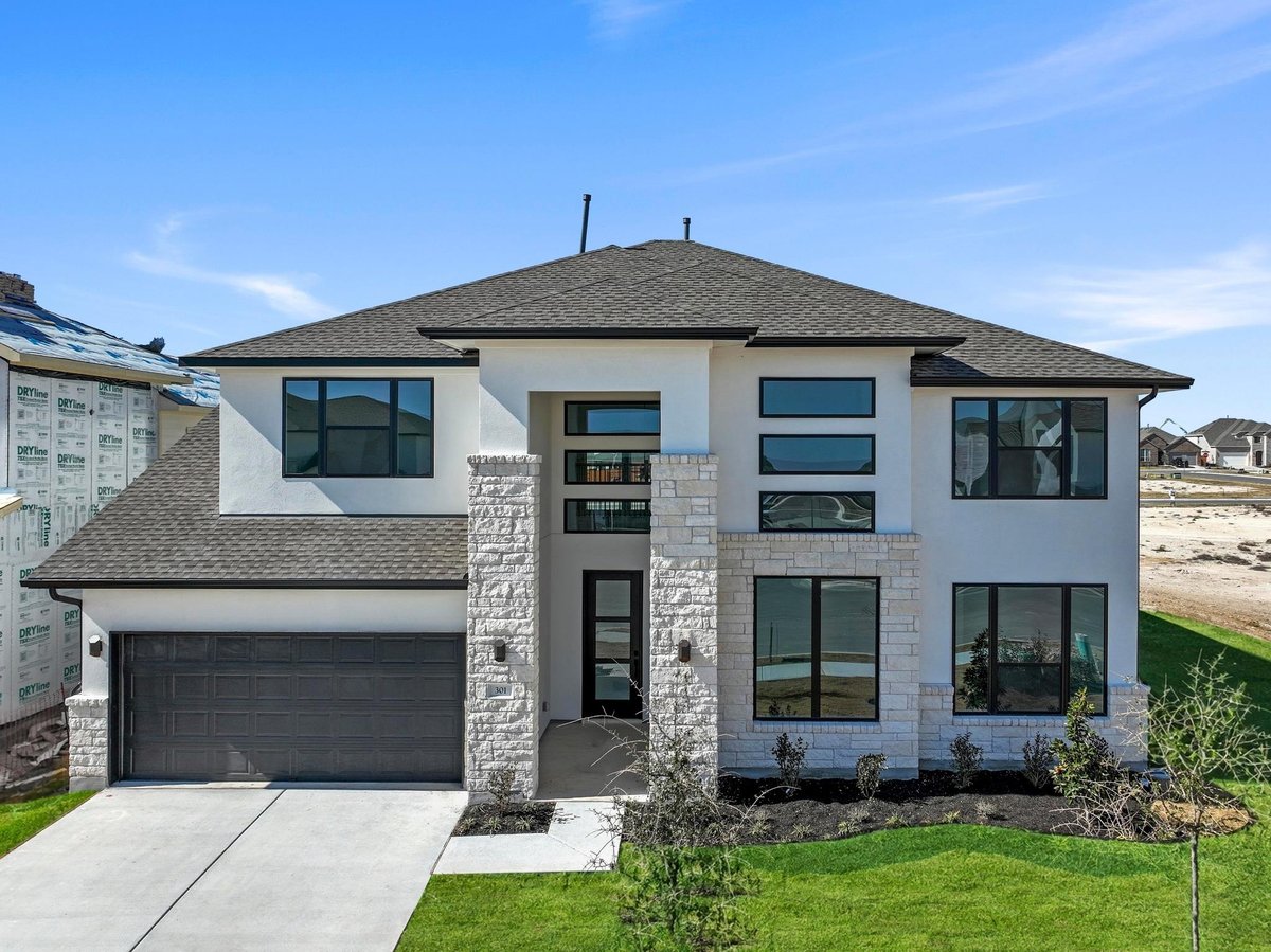 View 301 Sheepdog DR in Lariat 301 Sheepdog DR - front exterior - Luxury home in Lariat, Liberty Hill, TX