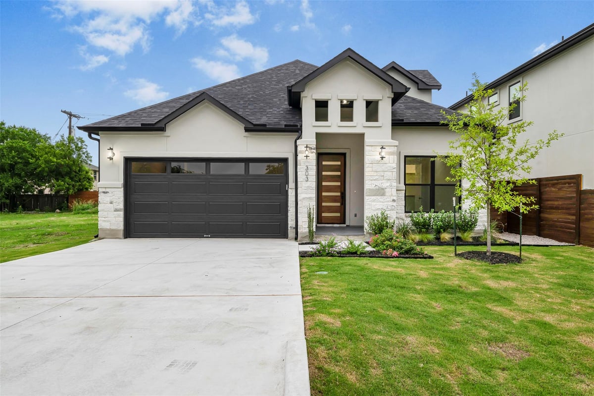 View 303 W Lane Ave in Manor Town 303 W Lane Ave - front exterior - Luxury home in Manor Town, Manor, TX