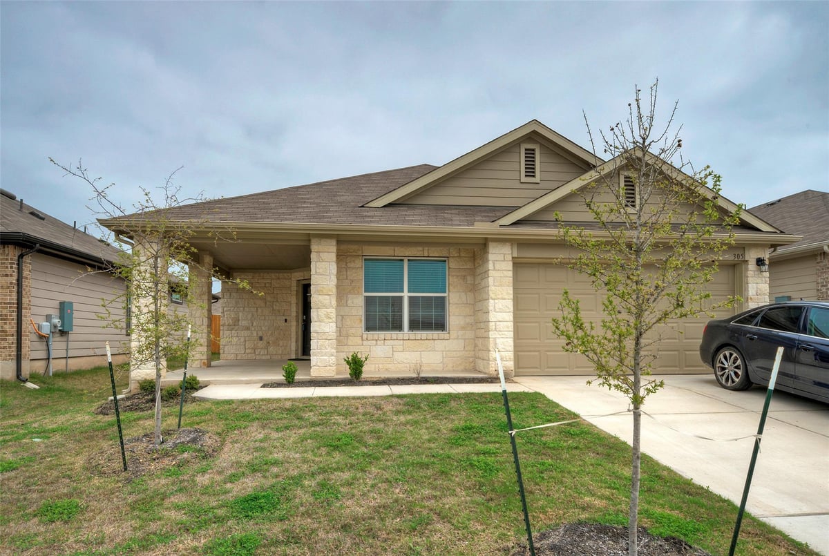View 305 ELM CREEK Dr in SOUTHGATE 305 ELM CREEK Dr - front exterior - Luxury home in SOUTHGATE, Hutto, TX