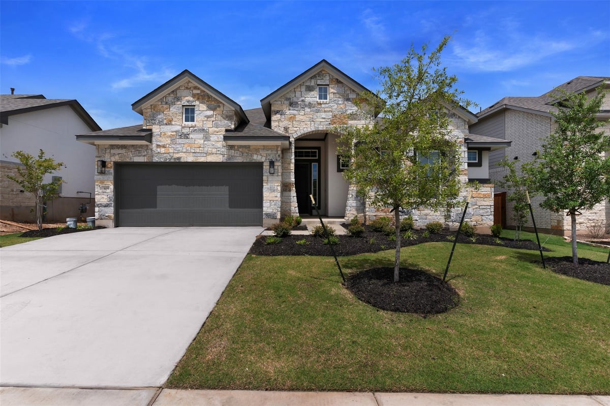 View 305 Oak Blossom RD in Lariat 305 Oak Blossom RD - front exterior - Luxury home in Lariat, Liberty Hill, TX