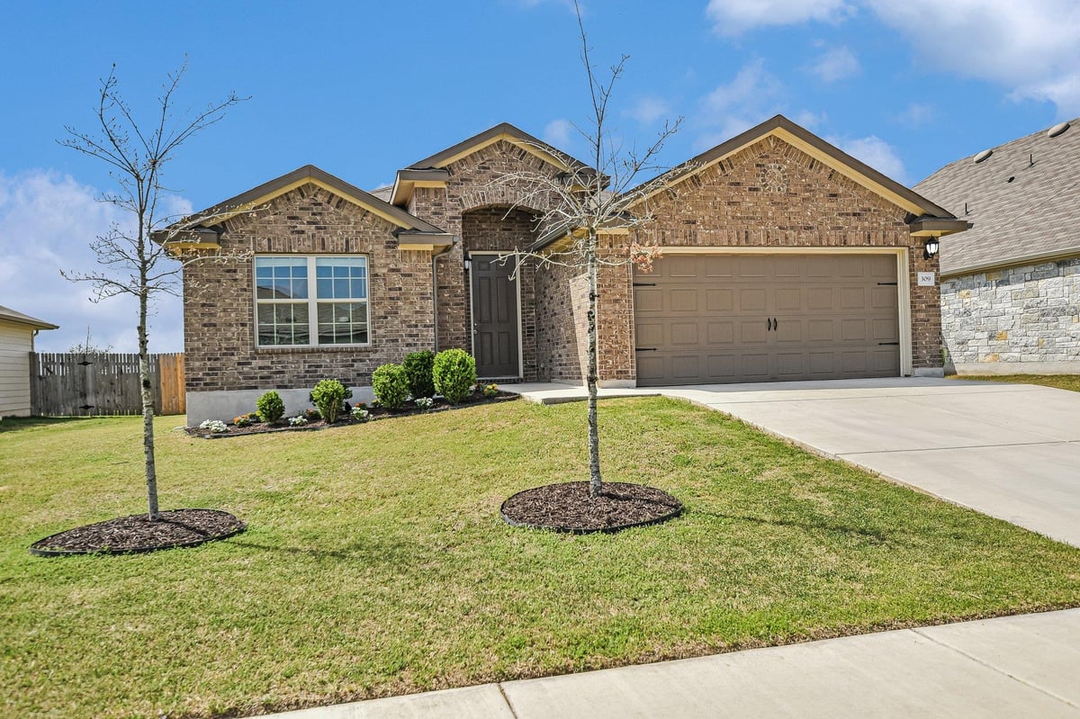 View 309 Chickasaw Ln in Hutto Highlands 309 Chickasaw Ln - front exterior - Luxury home in Hutto Highlands, Hutto, TX