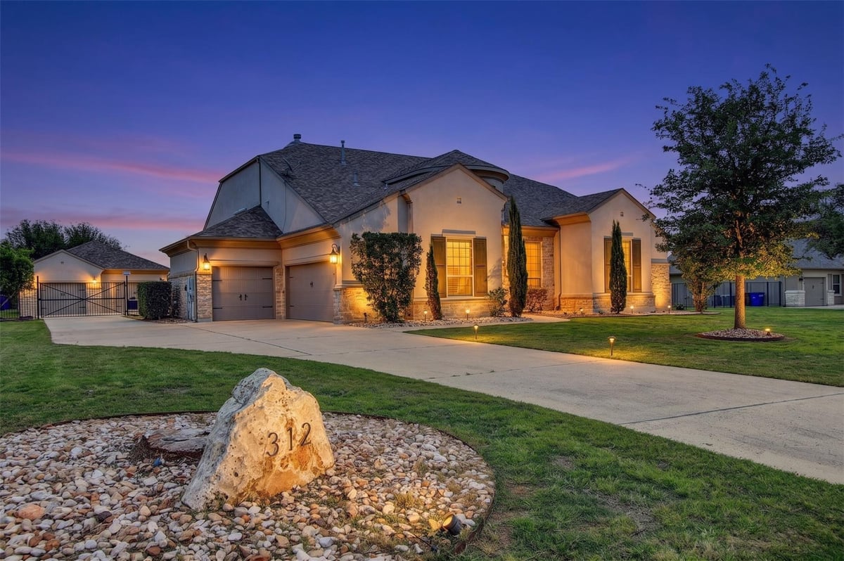 View 312 Flintlock Dr in Reagans Overlook 312 Flintlock Dr - front exterior - Luxury home in Reagans Overlook, Leander, TX