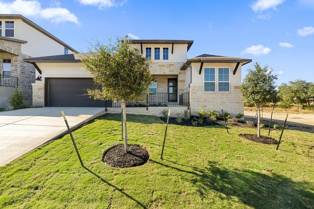 View 321 Smoke Signal Court in Lariat 321 Smoke Signal Court - front exterior - Luxury home in Lariat, Liberty Hill, TX