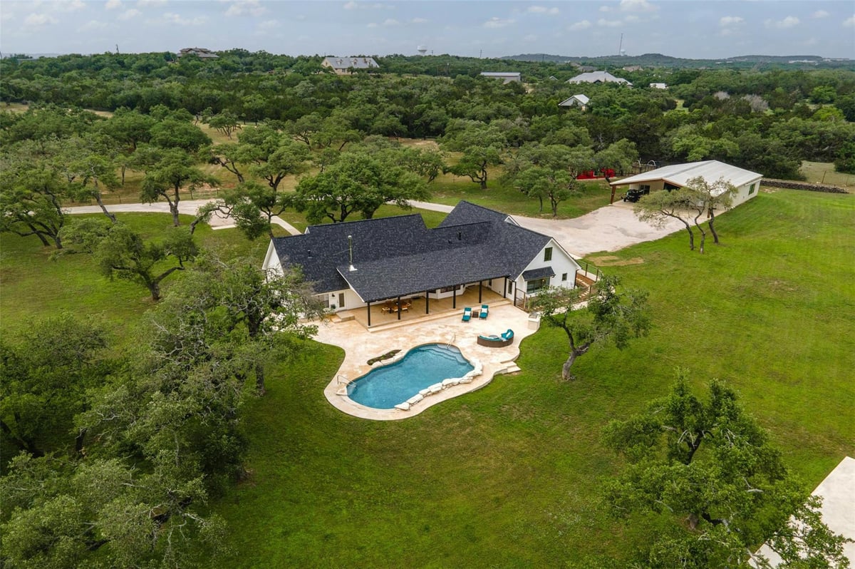 View 333 Stallion Ln in Stallion Lane Estates 333 Stallion Ln - front exterior - Luxury home in Stallion Lane Estates, Dripping Springs, TX