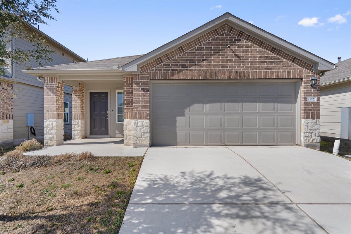 View 352 Sickle Loop in Harvest Creek Ph2 352 Sickle Loop - front exterior - Luxury home in Harvest Creek Ph2, Uhland, TX
