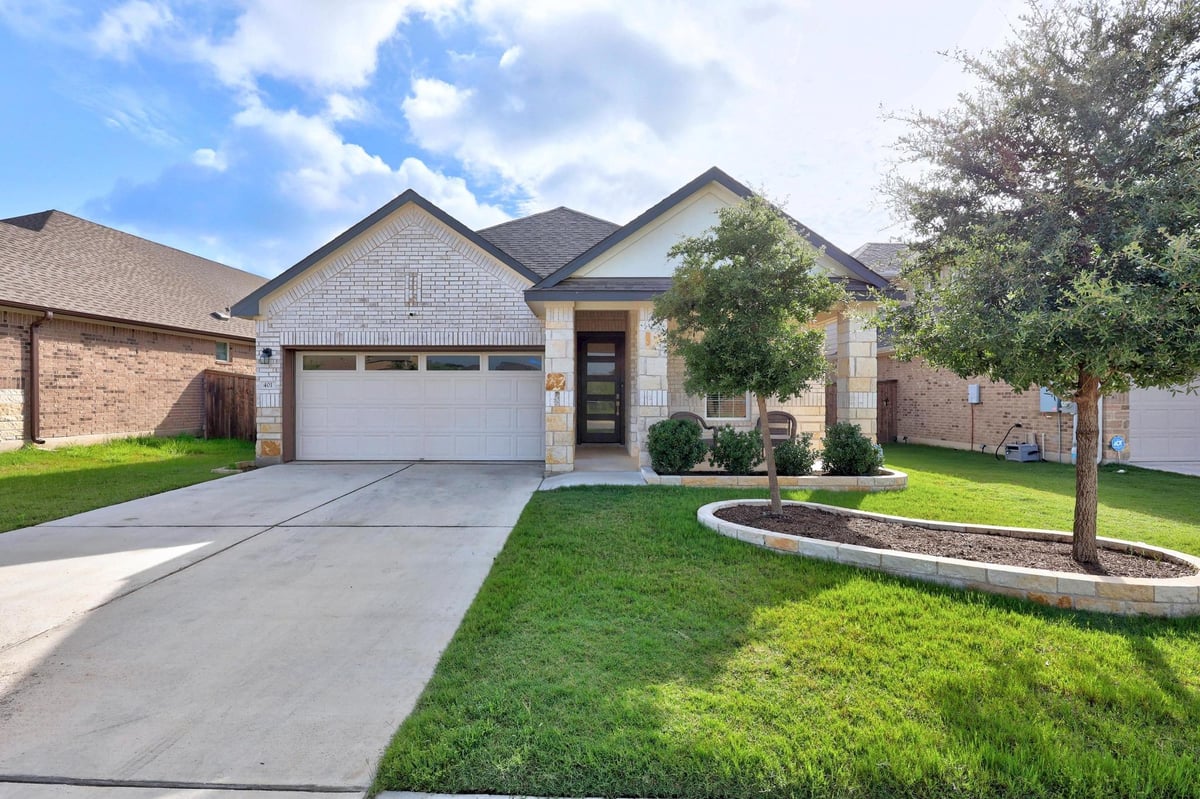 View 401 Peace Pipe WAY in Riverview 401 Peace Pipe WAY - front exterior - Luxury home in Riverview, Georgetown, TX
