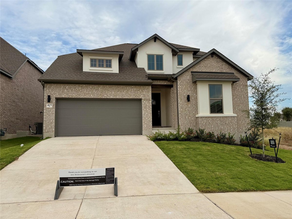View 405 Texas Sky Dr in Wolf Ranch West Bend 405 Texas Sky Dr - front exterior - Luxury home in Wolf Ranch West Bend, Georgetown, TX