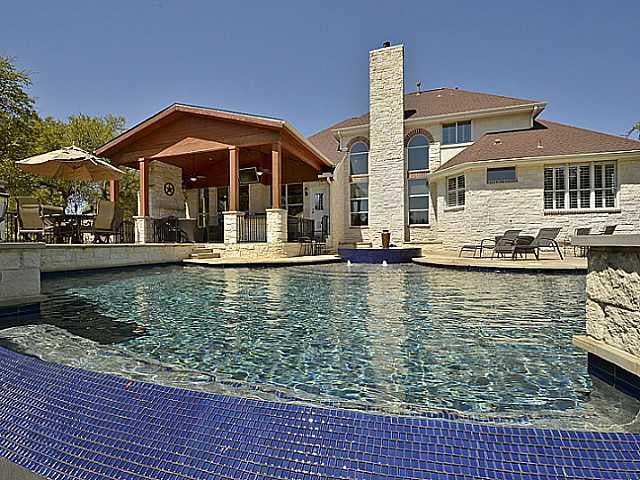 View 4333 Lago Viento in Lakewind Estates Sec 03 4333 Lago Viento - front exterior - Luxury home in Lakewind Estates Sec 03, Austin, TX