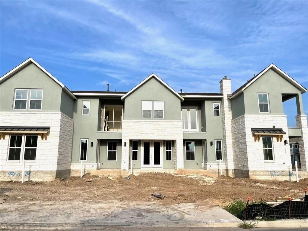View 4401 Vaughan St Unit #E in Mueller House II Condominiums 4401 Vaughan St Unit #E - front exterior - Luxury home in Mueller House II Condominiums, Austin, TX