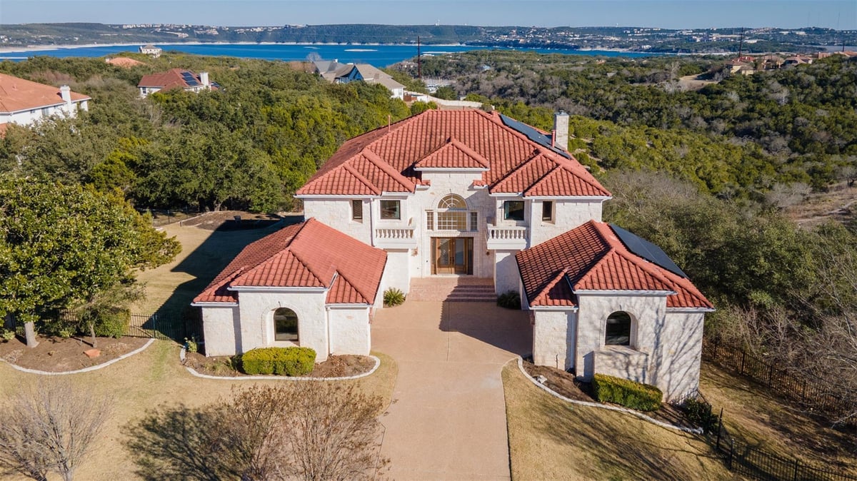 View 4415 Lago Viento in Lakewind Estates Sec 03 4415 Lago Viento - front exterior - Luxury home in Lakewind Estates Sec 03, Austin, TX