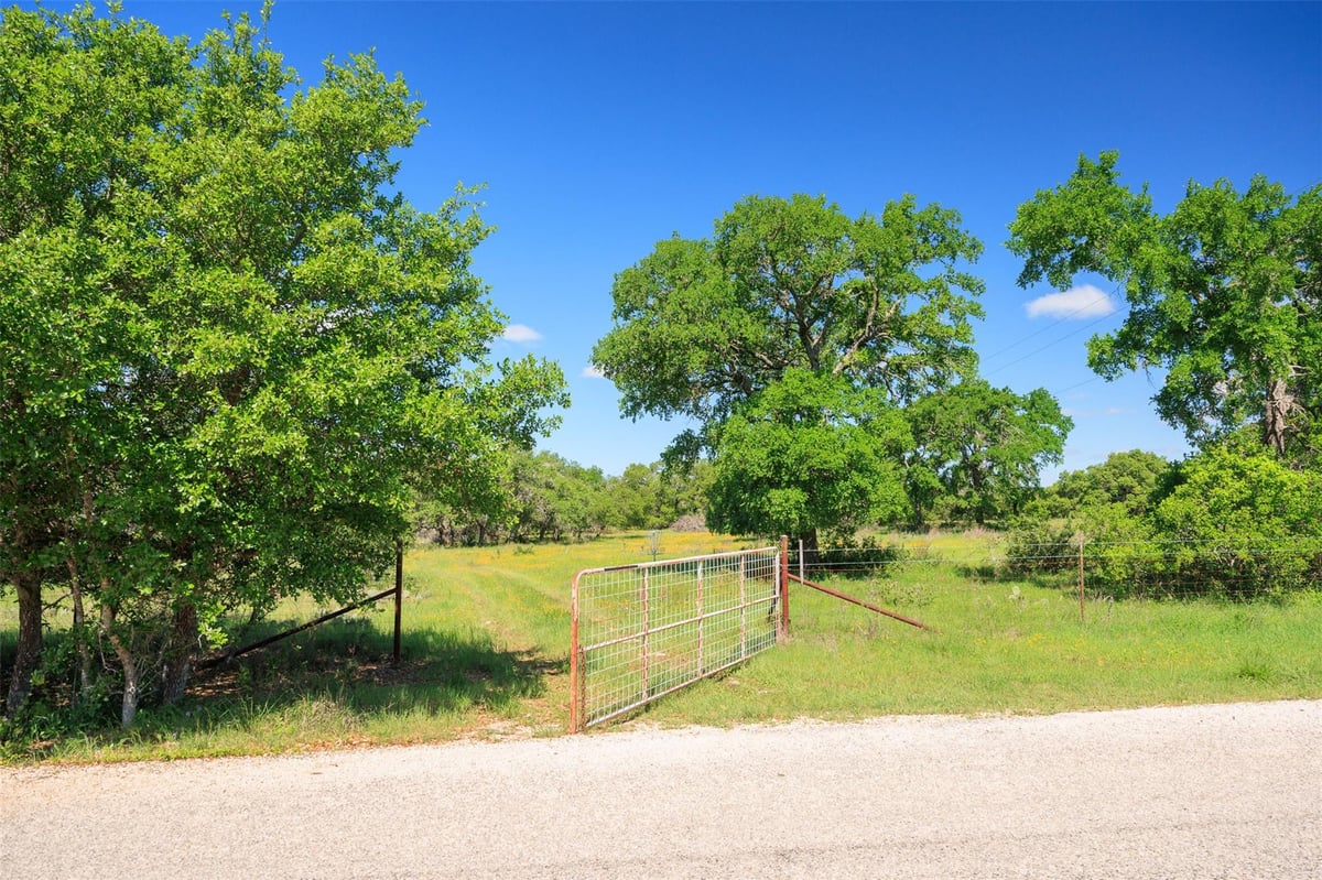 View 480 Blue Creek Dr in Blue Creek Ranch 480 Blue Creek Dr - front exterior - Luxury lot in Blue Creek Ranch, Dripping Springs, TX