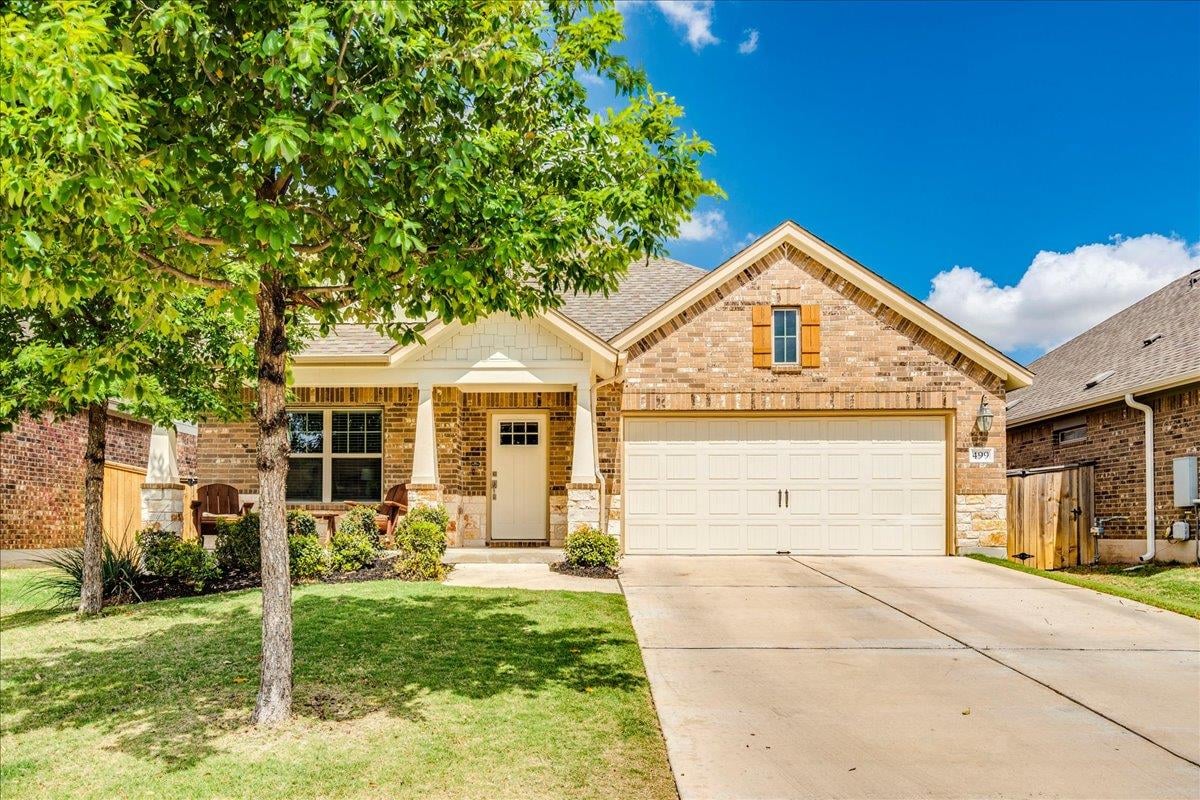 View 499 Coyote Creek WAY in 6 Creeks Ph 1 Sec 1 499 Coyote Creek WAY - front exterior - Luxury home in 6 Creeks Ph 1 Sec 1, Kyle, TX