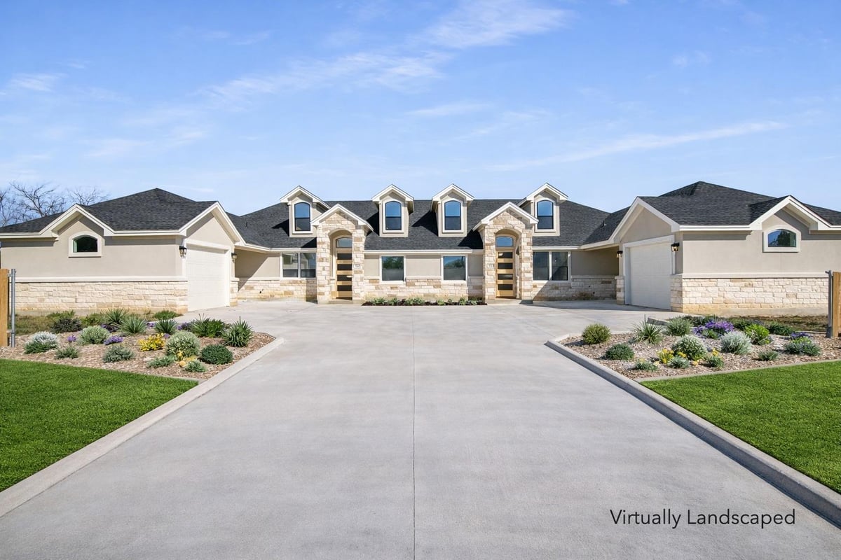 View 511-513 Lion Dr in Leander Heights Sec Two 511-513 Lion Dr - front exterior - Luxury home in Leander Heights Sec Two, Leander, TX