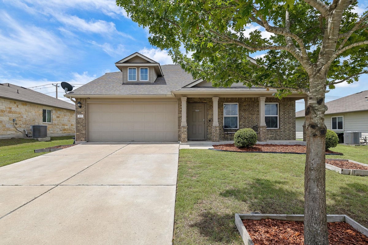 View 605 San Antonio Riverwalk WALK in Riverwalk Ph 2 Sec 4 605 San Antonio Riverwalk WALK - front exterior - Luxury home in Riverwalk Ph 2 Sec 4, Hutto, TX