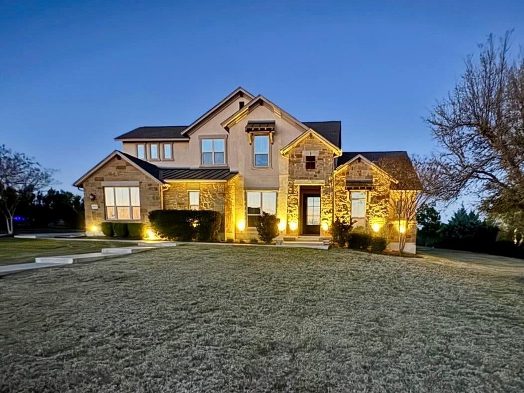 View 608 Brave Face St in Grand Mesa At Crystal Falls Ii 608 Brave Face St - front exterior - Luxury home in Grand Mesa At Crystal Falls Ii, Leander, TX