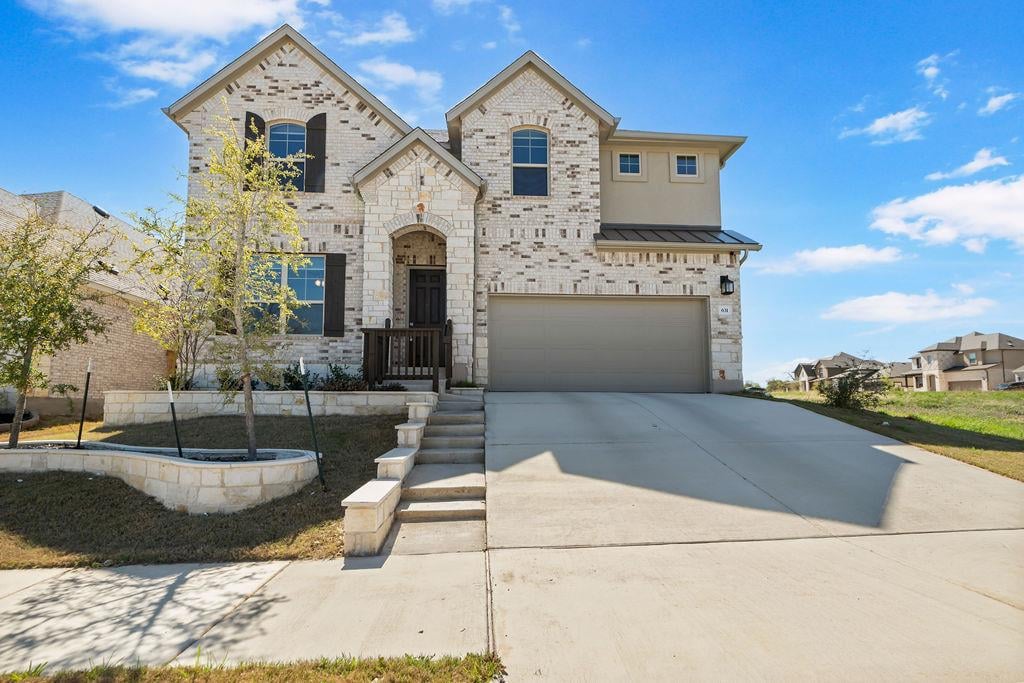 View 631 Breeze Hollow LN in Oaks/San Gabriel Sec 13 631 Breeze Hollow LN - front exterior - Luxury home in Oaks/San Gabriel Sec 13, Georgetown, TX